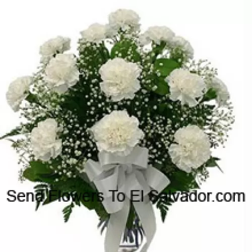 18 White Carnations With Seasonal Fillers In A Glass Vase