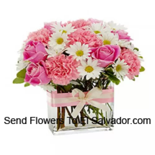 Pink Roses, Pink Carnations And Assorted White Seasonal Flowers Arranged Beautifully In A Glass Vase