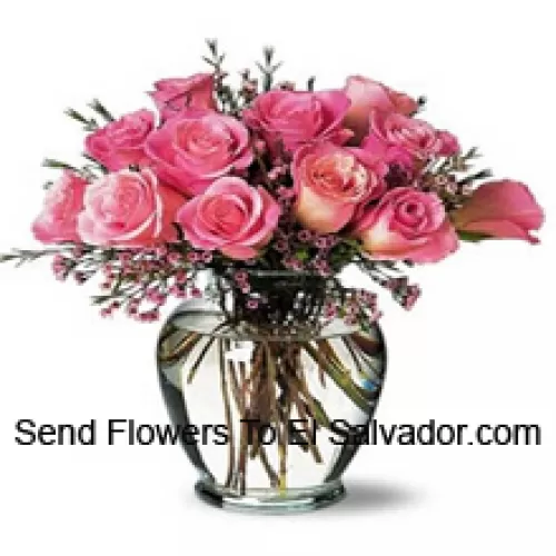 12 Pink Roses With Some Ferns In A Vase