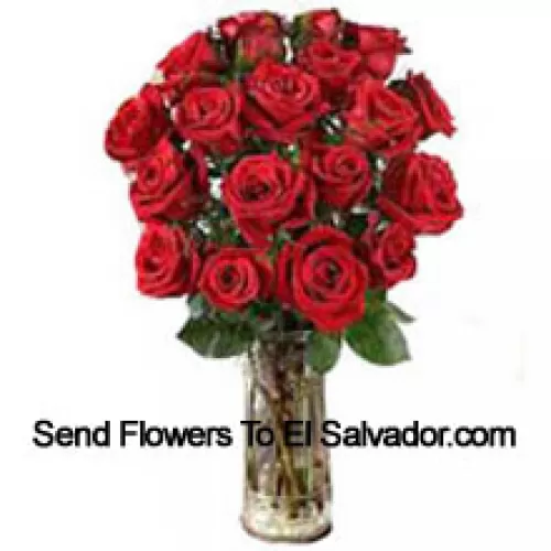 18 Red Roses With Some Ferns In A Vase