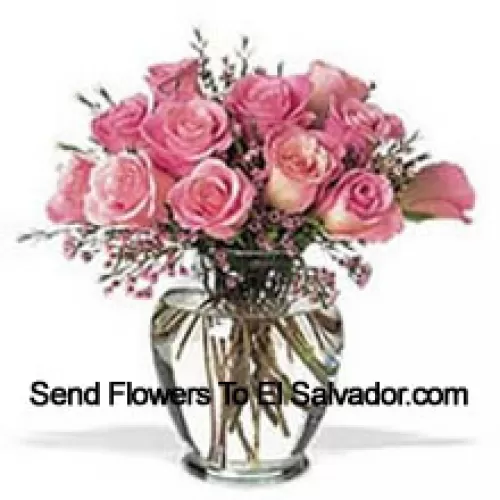 Bunch Of 12 Pink Roses With Some Ferns In A Vase