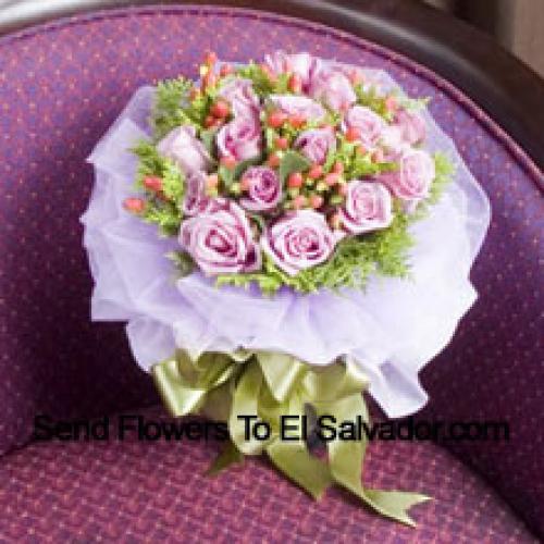 12 Light Pink Wrapped Roses