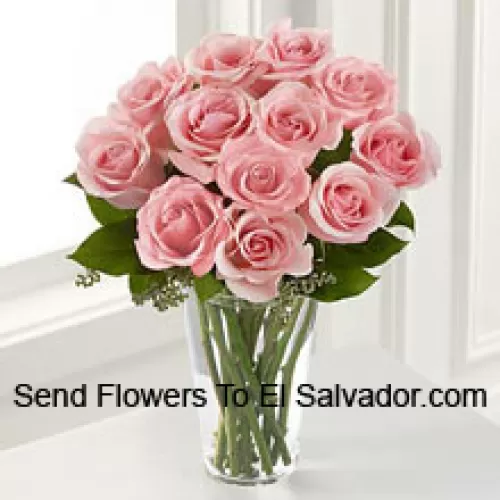 12 Pink Roses With Some Ferns In A Vase