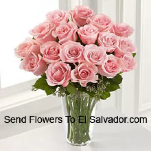 18 Pink Roses With Some Ferns In A Vase