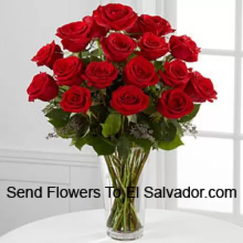 18 Red Roses With Some Ferns In A Vase