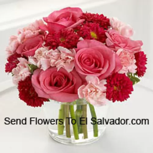 6 Pink Roses, 10 Red Colored Daisies And 10 Pink Colored Carnations In A Glass Vase