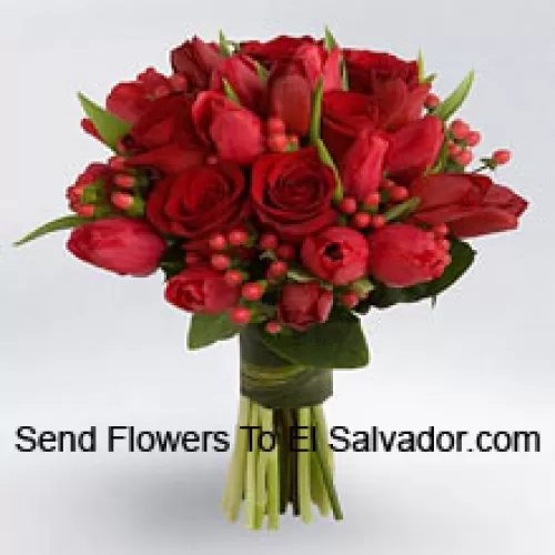 Bunch Of Red Roses And Red Tulips With Red Seasonal Fillers.