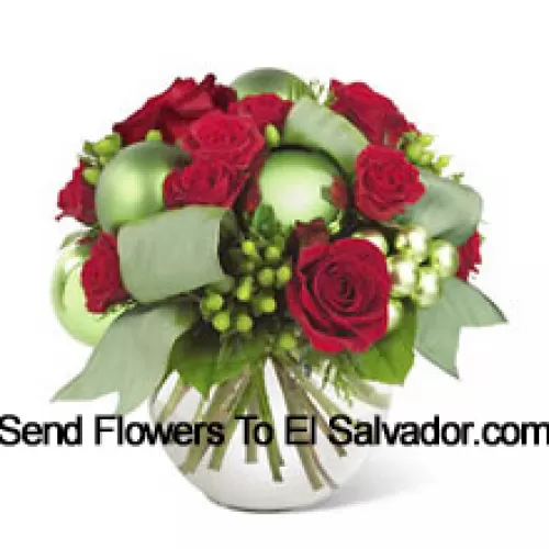 This new holiday bouquet combines festive red roses, spray roses and more with bright green ornaments and seasonal accents for a classic look with a contemporary new twist!  (Please Note That We Reserve The Right To Substitute Any Product With A Suitable Product Of Equal Value In Case Of Non-Availability Of A Certain Product)