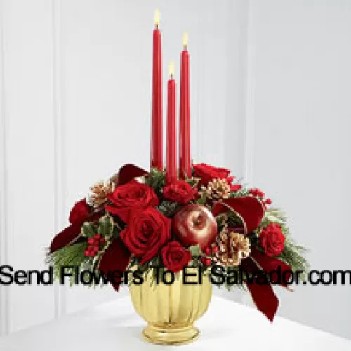 The grandeur and rich beauty of the Christmas season are highlighted with each crimson bloom. Bright red roses and spray roses are arranged in a designer gold container amongst variegated holly and assorted holiday greens. Accented with artificial apples, gold pinecones and gold-edged burgundy ribbon, this gorgeous centerpiece displays three red taper candles to create the perfect atmosphere for their holiday celebration.  (Please Note That We Reserve The Right To Substitute Any Product With A Suitable Product Of Equal Value In Case Of Non-Availability Of A Certain Product)