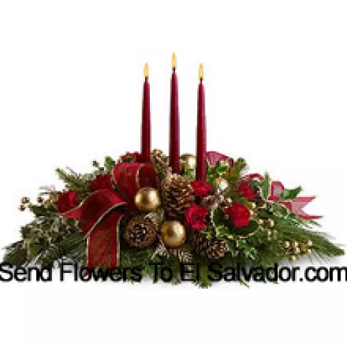 Red miniature carnations, pinecones, golden ornament balls, faux berries and assorted fresh evergreens  accented with a wired ribbon are arranged in a low dish with three red taper candles. (Please Note That We Reserve The Right To Substitute Any Product With A Suitable Product Of Equal Value In Case Of Non-Availability Of A Certain Product)